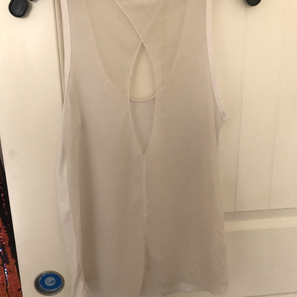 White Tank With Mesh Back In Small.